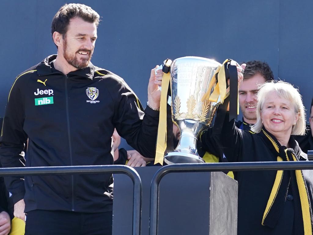 Brendon Gale (L) with the 2019 premiership cup. (AAP Image/Michael Dodge)