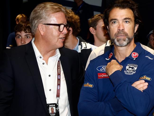 GEELONG, AUSTRALIA - MARCH 16: Cats CEO Steve Hocking and Chris Scott, Senior Coach of the Cats chat after the 2024 AFL Round 01 match between the Geelong Cats and the St Kilda Saints at GMHBA Stadium on March 16, 2024 in Geelong, Australia. (Photo by Michael Willson/AFL Photos via Getty Images)