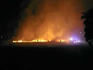 LIT UP: Kingaroy firefighters tackle the blaze on Kelvyn St on the second night, Saturday August 4 at 11pm. Picture: Robert Postlethwaite