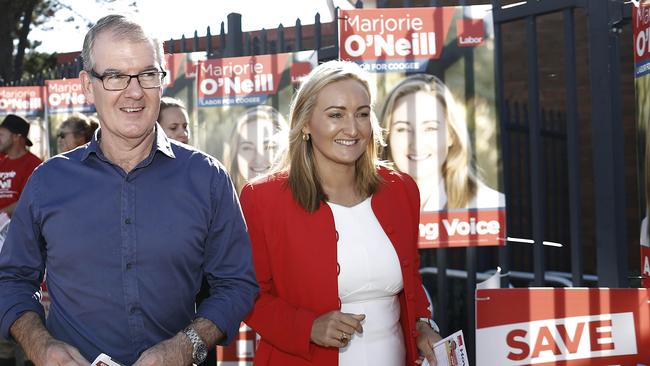 Opposition leader Michael Daley and Marjorie O'Neill spoke to voters at South Coogee Public School on Saturday. Photo: Ryan Pierse.