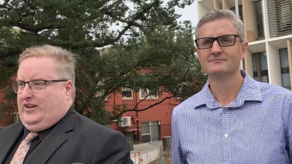 Rape accused Vaughan Rogers (right) leaves Wollongong Local Court with his lawyer on May 1.