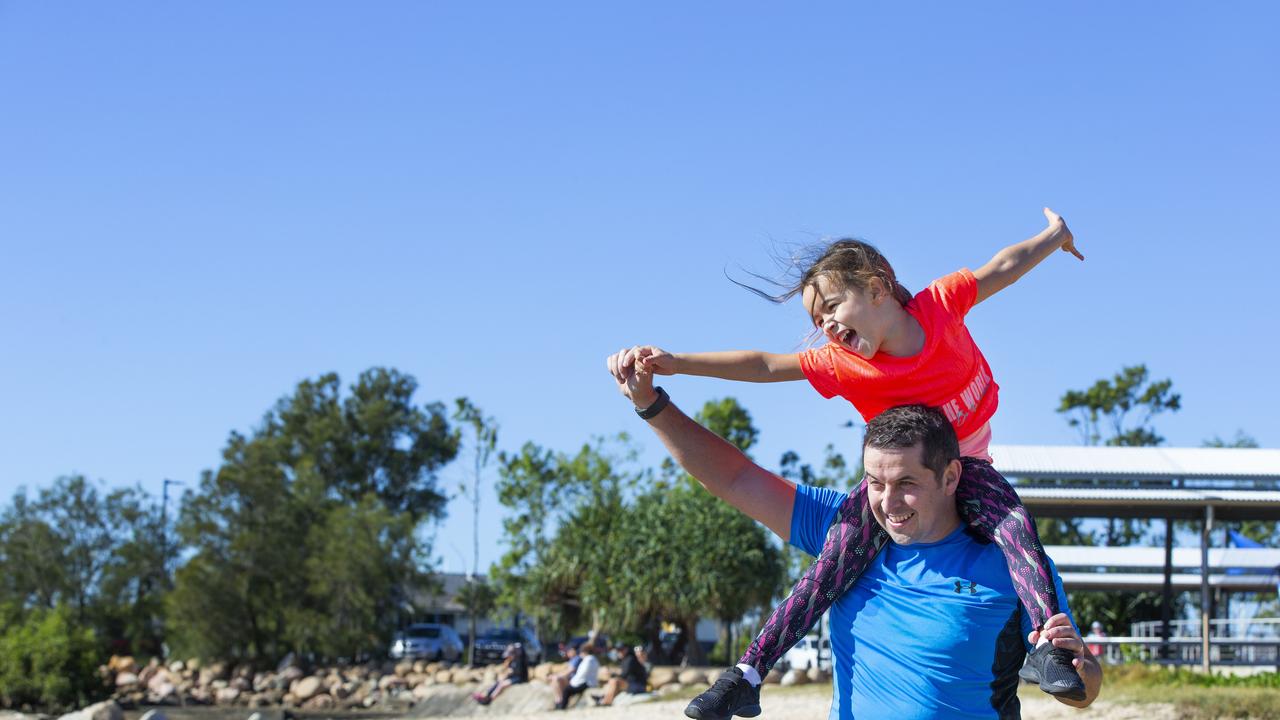 COVID-19 restrictions eased in Qld. Darran Whelan with his 6 year old daughter Ellie-Mae enjoy the Manly foreshore. 2.05.2020. Picture: Renae Droop