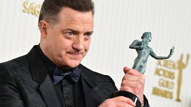 Brendan Fraser poses with the award for outstanding Male Actor in a Leading Role - Motion Picture for 
