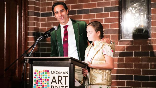 Mosman Art Prize winner Michael Zavros makes his acceptance speech with daughter Phoebe.