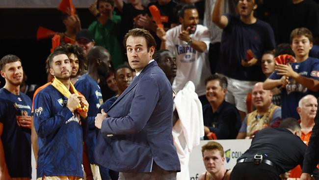 Kings head coach Chase Buford leaves the court after a technical violation in the final quarter of the NBL semi final match between the Cairns Taipans and the Sydney Kings, held at the Cairns Convention Centre. Photo: Brendan Radke