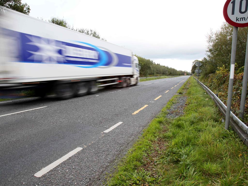 The painted markings show the change from white (Northern Ireland) to yellow (Ireland) on on the outskirts of Clones, County Monaghan, on the border between the two jurisdictions. Once Brexit goes ahead, physical checkpoints could be installed here. Picture: Paul Faith/AFP