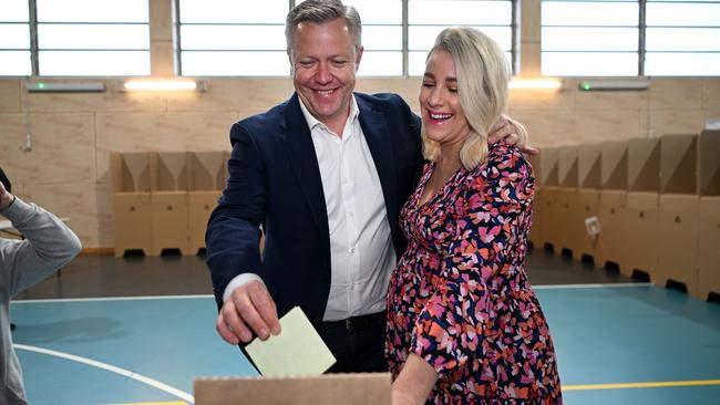 LNP candidate Cameron Caldwell and wife Lauren vote at Coomera Rivers State School on Saturday. Picture: Dan Peled / NCA Newswire