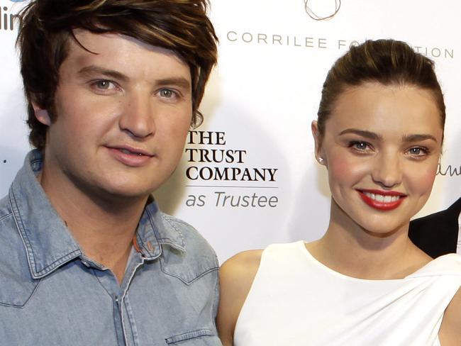 Model Miranda Kerr with brother Matthew, father John and mother Therese at the launch of Kids Helpline at The Sydney Trust in the Sydney CBD.