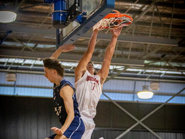 Queensland North's Travis Drinnan dunks on Victoria Metro at the U18 Basketball Australia National Championships in Brisbane. Picture: Taylor Earnshaw Photography