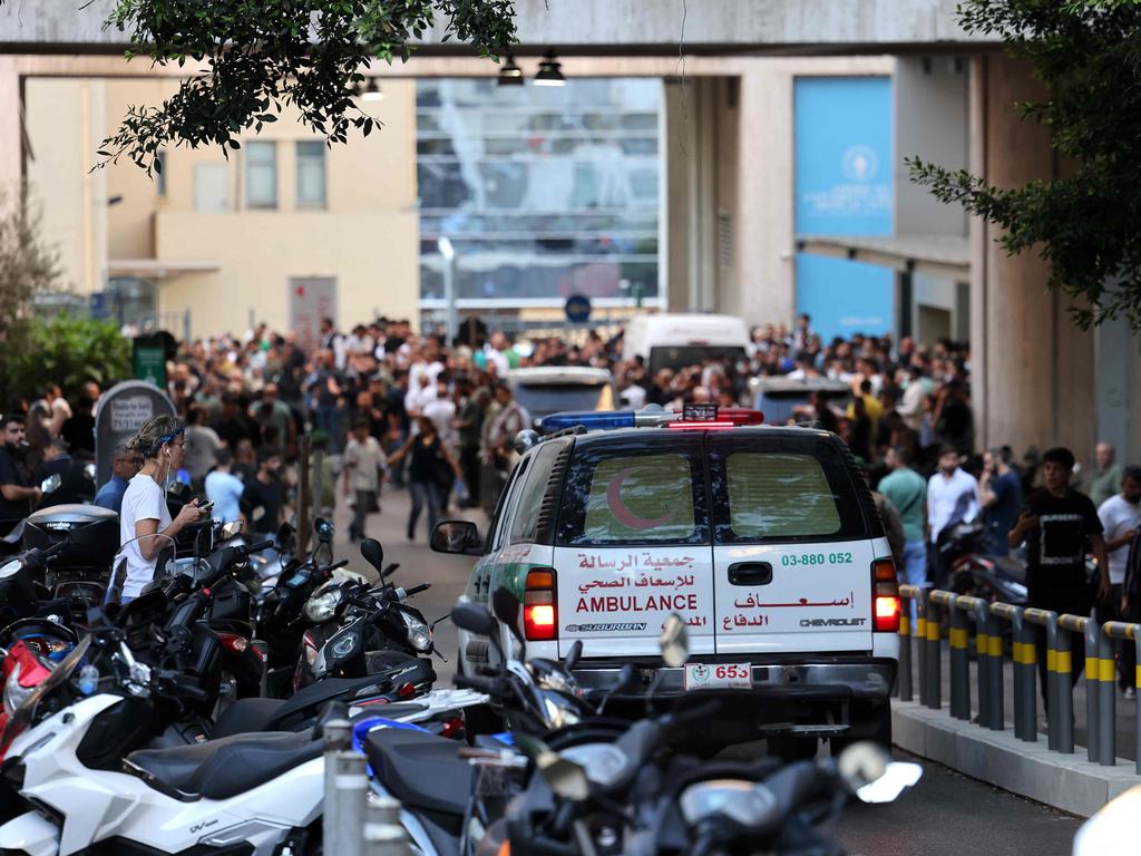 An ambulance rushes wounded people to the American University of Beirut Medical Centre after hundreds of pagers exploded across Lebanon. Picture: AFP