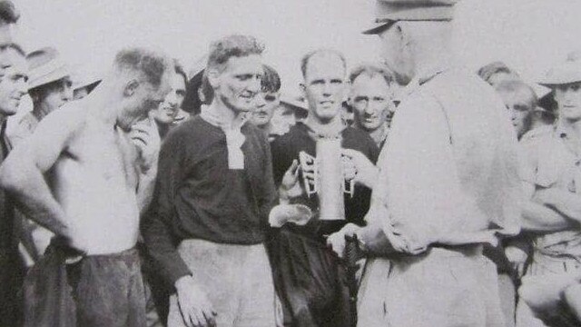 The trophy is awarded to the Queenslanders in Bougainville.