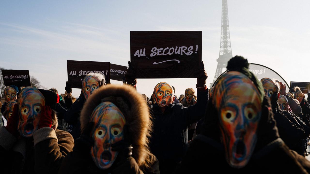 Protesters wear masks depicting Edvard Munch's painting ‘The Scream’ during a demonstration against a bill to legalise assisted suicide. Picture: Dimitar Dilkoff/AFP