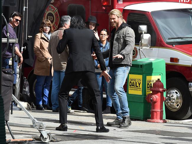 Hollywood actors Chris Hemsworth (right) and Tom Hiddleston joke after acting a scene during the filming of the movie Thor: Ragnarok in Brisbane. Picture: AAP