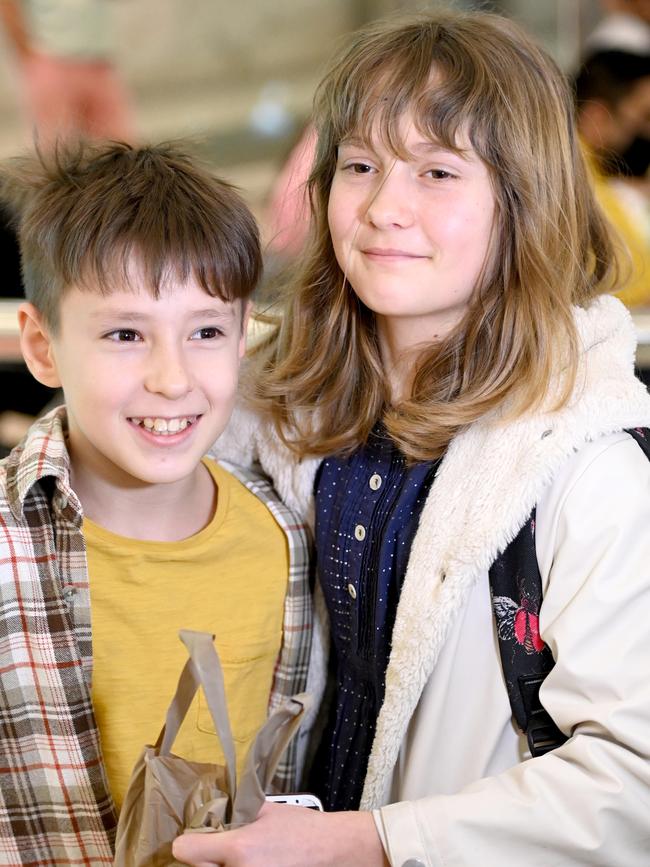 The siblings together again at Sydney International Airport. Picture: Jeremy Piper