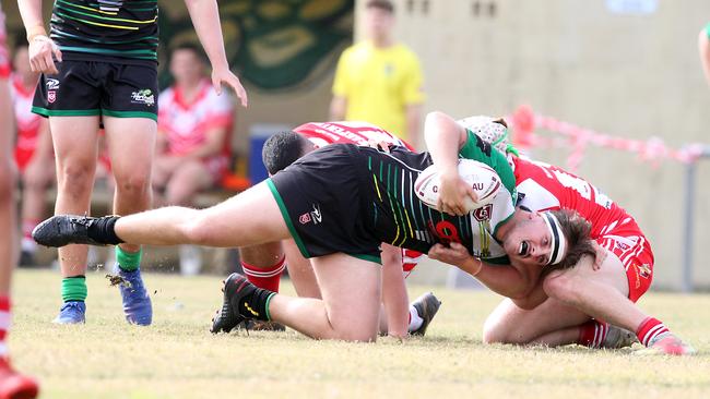 RLGC Round 3 match from Robert Dalley Park. Under 20's Helensvale Hornets vs. Currumbin Eagles. Jayden Searle tackled. 23 May 2021 Helensvale Picture by Richard Gosling