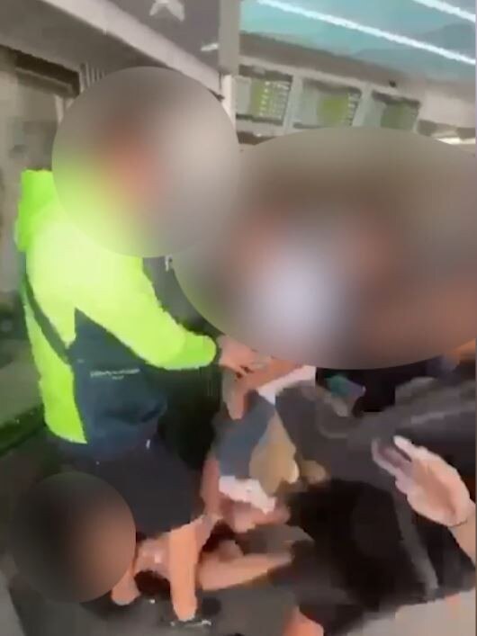 Still from shocking footage of a brutal bashing at a Gold Coast train station. Picture: Supplied