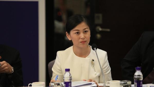 Self-proclaimed influence Jean Dong co-hosting the fourth China-Australia Belt and Road Financial Roundtable Dialogue in Beijing.