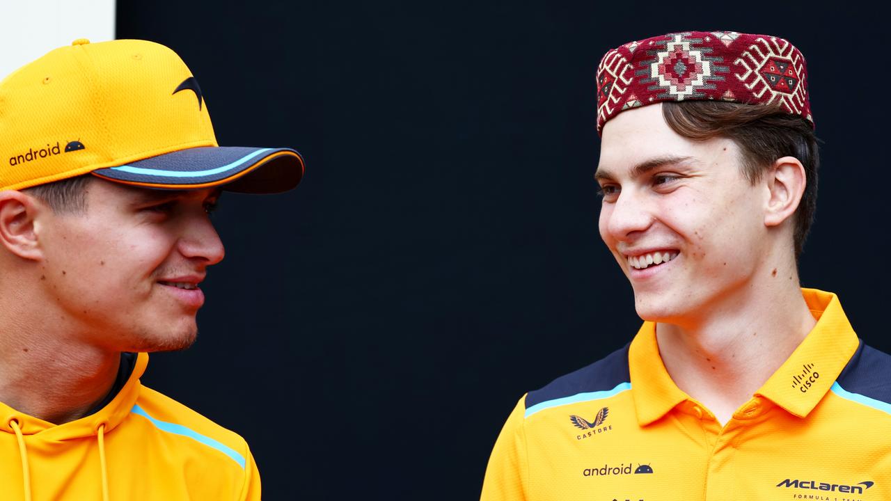 Oscar Piastri (right) of Australia and McLaren teammate Lando Norris talking in the paddock ahead of the F1 Grand Prix of Azerbaijan. Photo by Mark Thompson/Getty Images