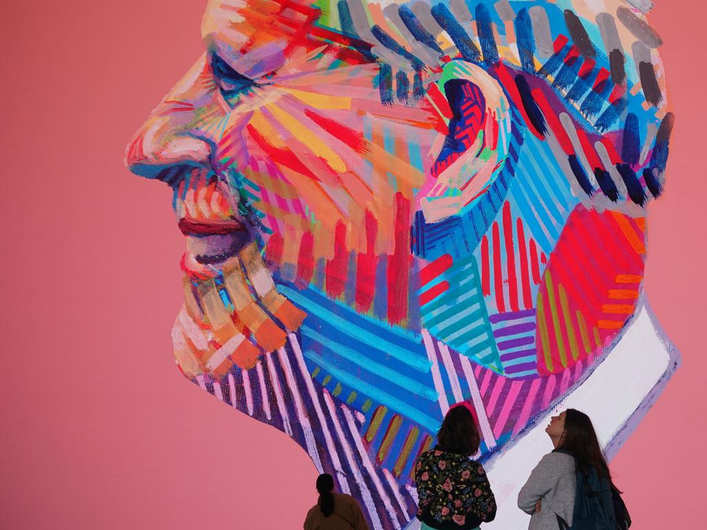 A digital portrait of King Charles III is unveiled on the screens at Outernet, London, ahead of his coronation this weekend. The giant portrait is made up from hundreds of thousands of individual images of the King drawn by members of the public from across the UK. Picture: Yui Mok/PA Images via Getty Images