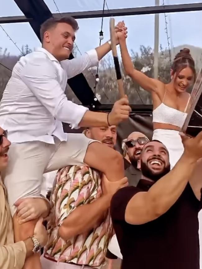 Kayla Itsines and Jae Woodroffe partying at their wedding. Picture: Instagram