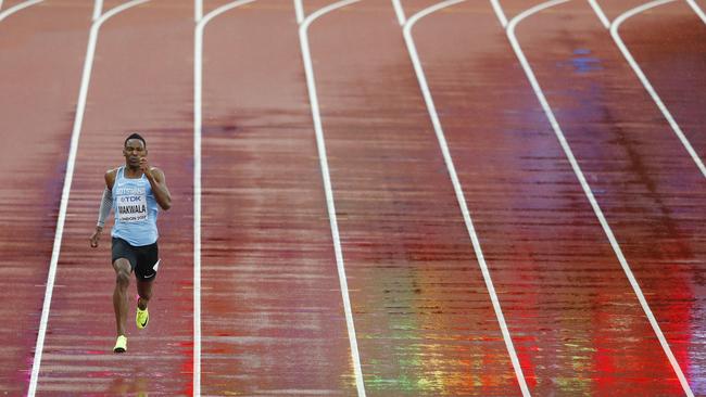Botswana's Isaac Makwala runs alone as he competes in the heats of the men's 200m athletics.