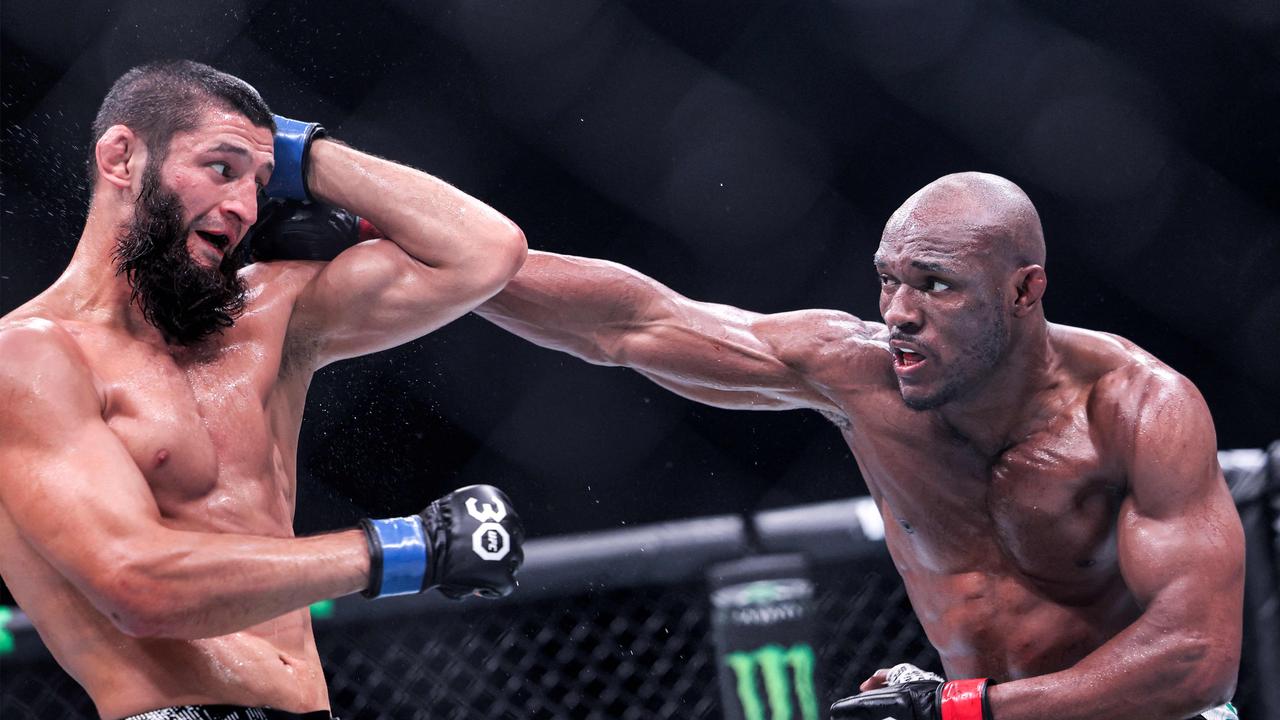 Russia's Khamzat Chimaev (black) and Nigeria's Kamaru Usman (white) in action last month.