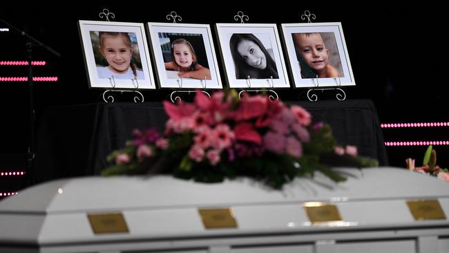 Framed photos of Hannah Clarke and her children Aaliyah, Laianah and Trey are on display during their funeral in Brisbane.