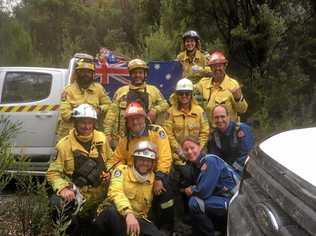 Clarence Valley volunteers Paul Johnston, Kirra Innes, Scott Campbell and Cody Jones with interstate crews in Tasmania. Picture: Peter Le Breton