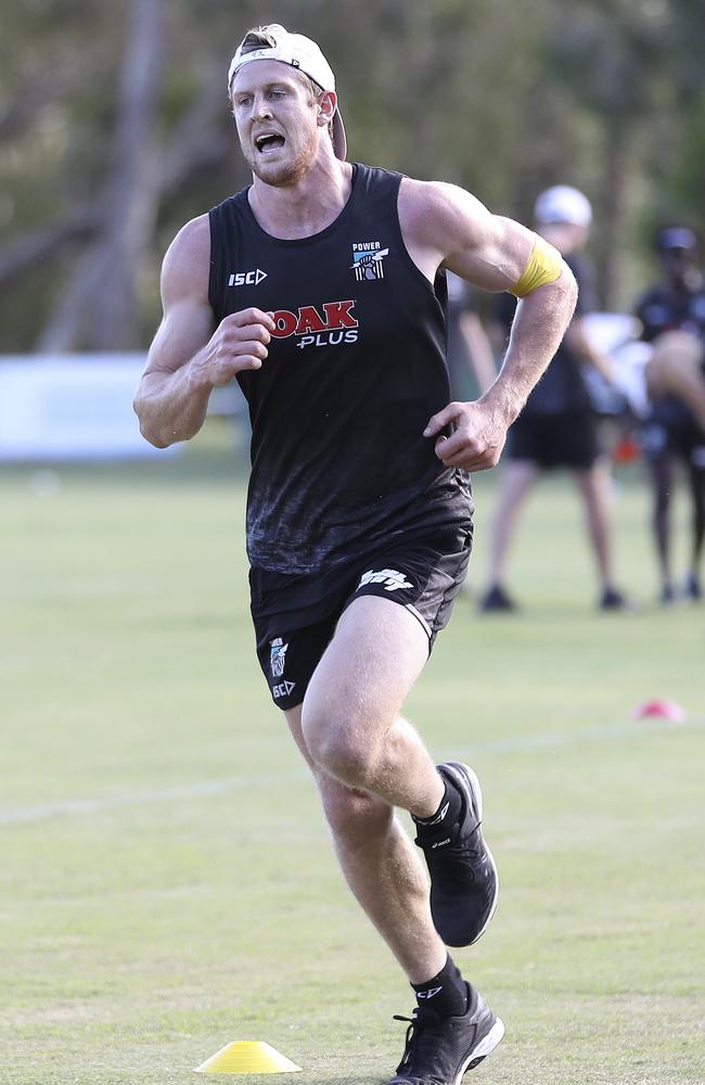 Tom Jonas feels the strain of Port’s first training session on the Sunshine Coast. Picture: Sarah Reed.