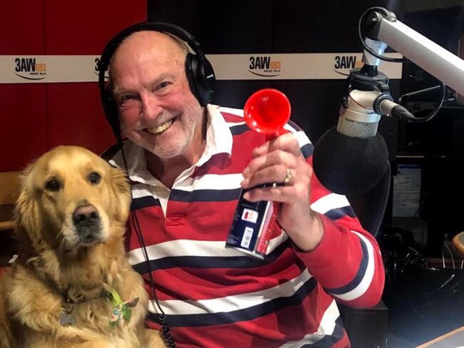 Rex Hunt in the 3AW studio with his golden retriever, Jack.