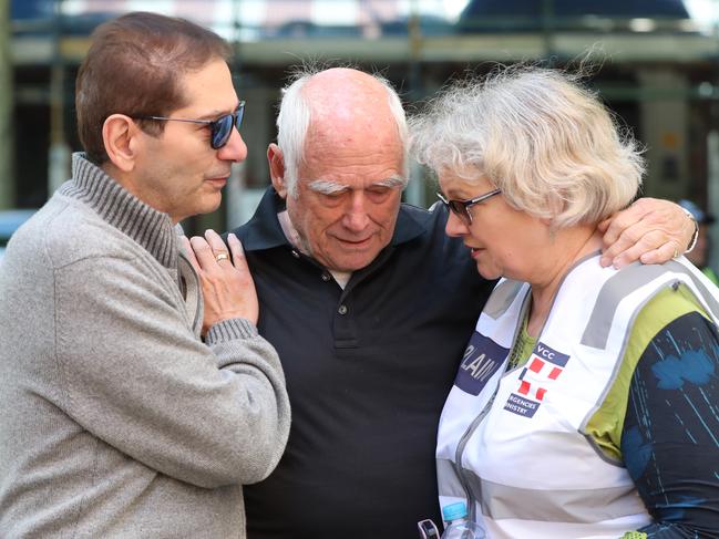 Sisto Malaspina’s business partner Nino Pangrazio is comforted after the tragic news. Picture: Alex Coppel.