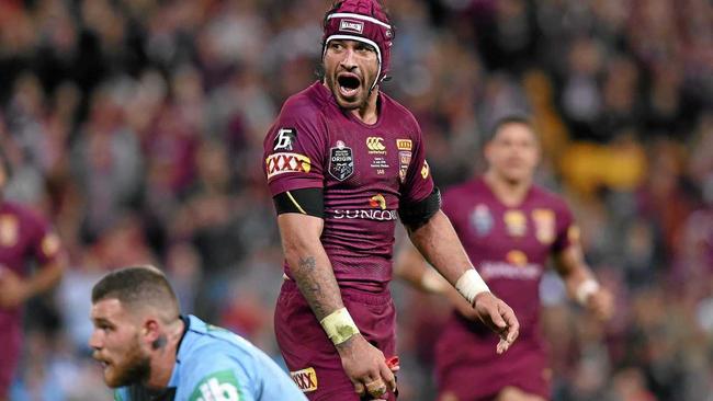 BEST EVER: Johnathan Thurston exalts during the 52-6 walloping of the Blues in Origin III in 2015. The Cowboys and Maroons maestro will be a future Immortal without doubt. Picture: AAP Image/Dave Hunt