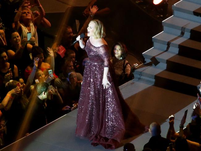 Adele in concert at the Gabba, where she told the city’s notoriously staid council to “stop your f***ing moaning”. Picture: Steve Pohlner