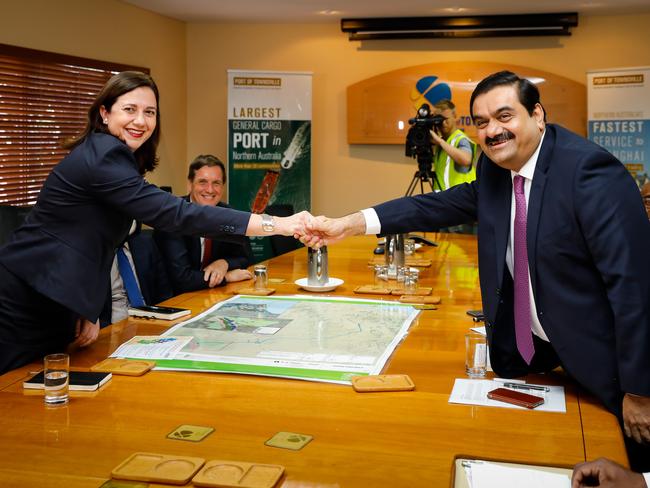 Adani Group chairman Gautam Adani meets with Queensland Premier Annastacia Palaszczuk in Townsville last year. The Queensland government has been given an ‘iron clad’ guarantee that Adani will not use 457 visas at its Carmichael mine and will prioritise local workers. Picture: Cameron Laird/AAP