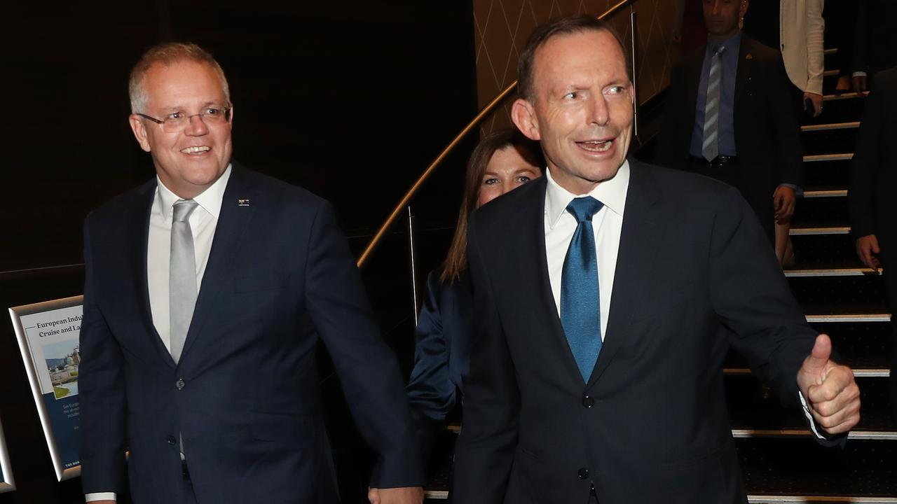 Prime Minister Scott Morrison and former prime minister Tony Abbott. Picture: Richard Dobson