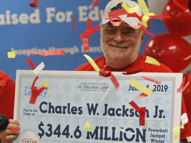 Charles W. Jackson Jr. is introduced as the winner of Saturday's $344.6 million Powerball jackpot Tuesday, June 4, 2019 at the N.C. Education Lottery headquarters in Raleigh, N.C. (Travis Long/The News & Observer via AP)