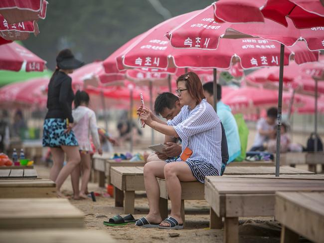 Gamers play Pokemon Go in Sokcho, South Korea. Picture: Getty