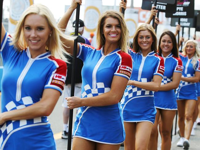 Gold Coast 2008 Miss V8 Supercars contestants walk down pit lane. Picture: Radke Brendan