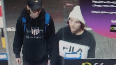 Police have released a picture of two people they say entered the store and filled up multiple bags with groceries. Picture: SA Police