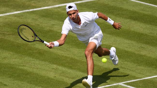 Alexei Popyrin of Australia plays a forehand in his Men's Singles second round match against Daniil Medvedev of Russia. Picture: Getty