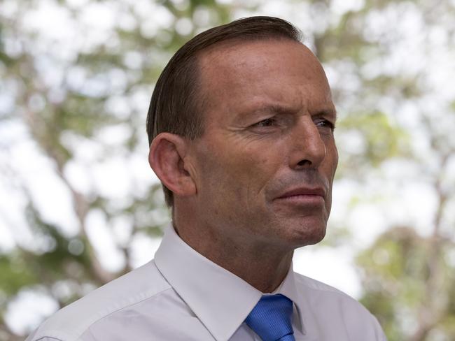 Prime Minister Tony Abbott speaks to the media during a visit to Larrakeyah Barracks in Darwin, Friday, Feb. 28, 2014. (AAP Image/Liam Carroll) NO ARCHIVING