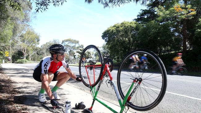 Jon Thornton of Eltham repairs a tack puncture during the Stop the Tacks Protest Ride  back in 2015. Picture: Mark Dadswell