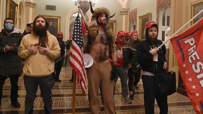 A member of the QAnon conspiracy group Jake Angeli during the US Capitol riots. Picture: AFP