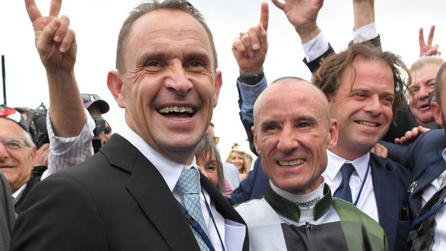 Trainer Chris Waller and jockey Glen Boss celebrate Yes Yes Yes’ win in The Everest. Picture: AAP