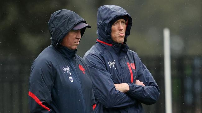 Coach Trent Robinson and assistant Craig Fitzgibbon during Sydney Roosters training at Kippax oval. Picture. Phil Hillyard