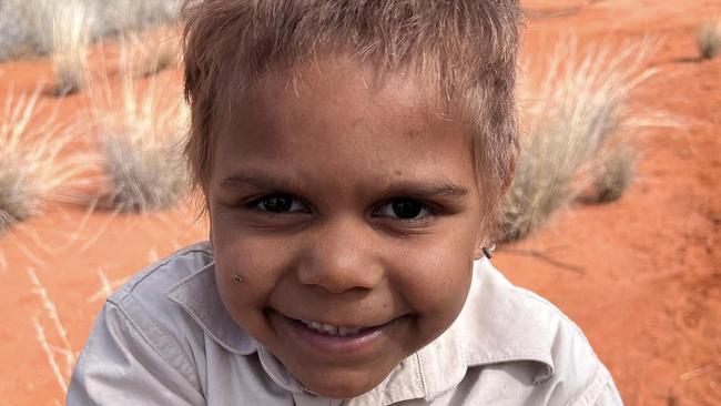 The Central Land Council took Mutitjulu School students on several outback excursions to look for tracks, burrows and bush foods. Picture: Department of Education