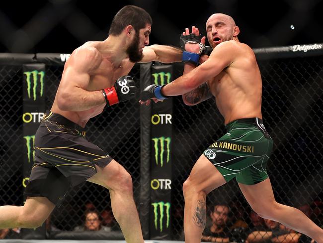 PERTH, AUSTRALIA - FEBRUARY 12: Islam Makhachev of Russia battles Alex Volkanovski of Australia in the UFC lightweight championship fight during UFC 284 at RAC Arena on February 12, 2023 in Perth, Australia. (Photo by Paul Kane/Getty Images)