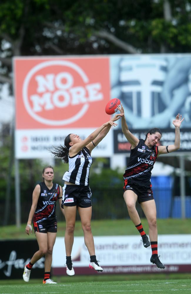 Dakota Pettit-Holmes against Bayley Valentine in the first game of the women's NTFL 22/23 season. Picture: (A)manda Parkinson