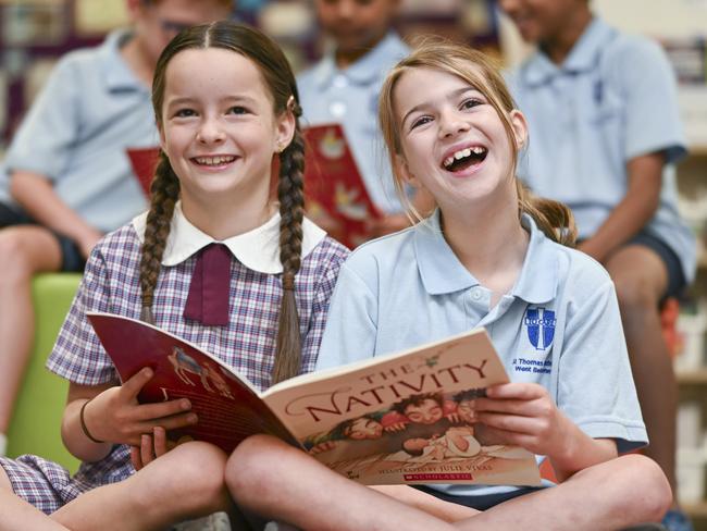 CANBERRA, AUSTRALIA - December 3, 2024: Year 5 students Faith and Elodie reading at St Thomas Aquinas Primary School in Canberra. Picture: Martin Ollman