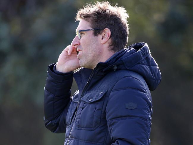 AFL rules trial with the St Kilda at Moorabbin . Port Adelaide's list manager Jason Cripps  watches on today  .Pic: Michael Klein